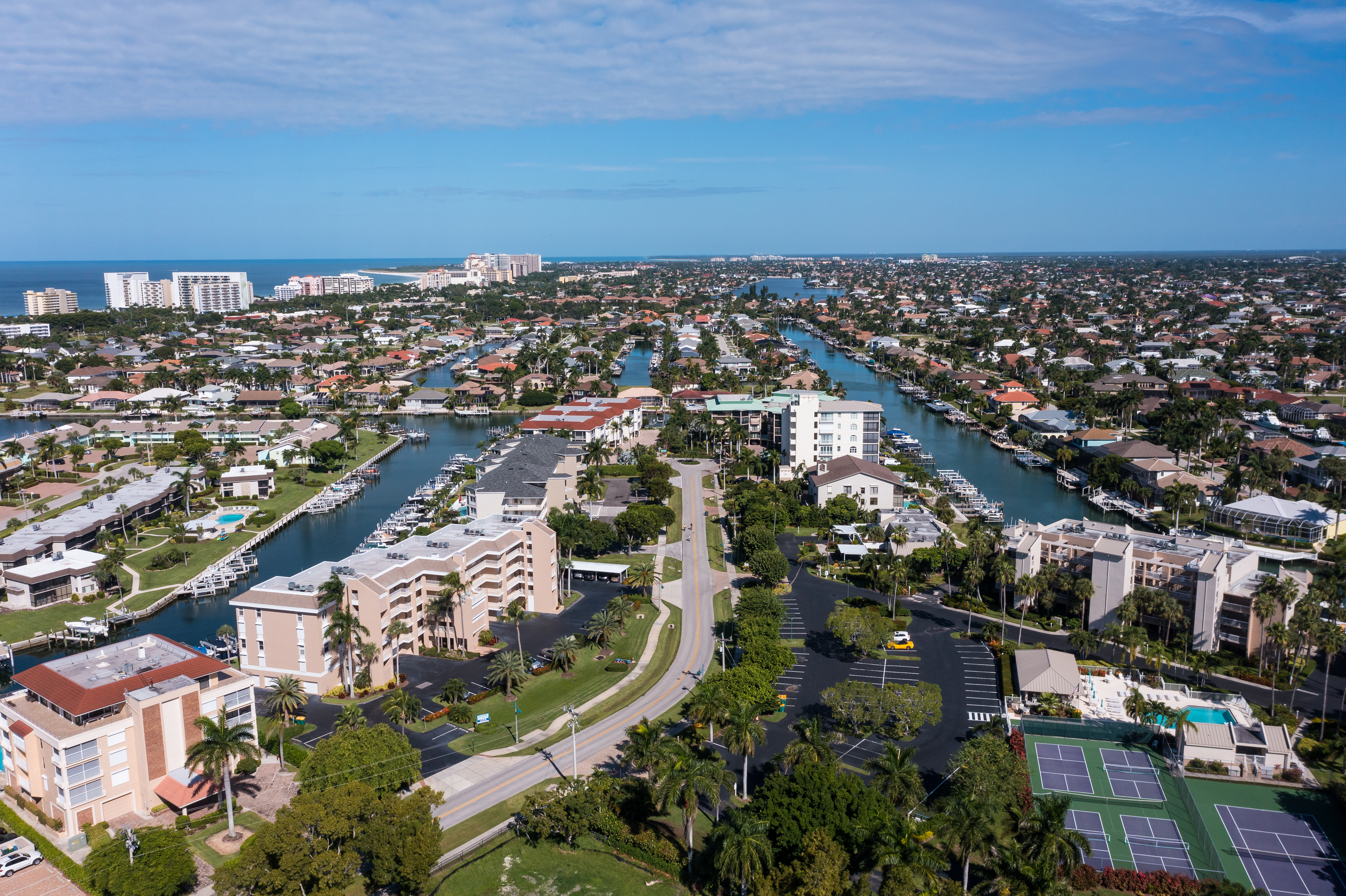 naples florida skyline aerial view buildings sky water palm trees naples florida skyline aerial view buildings sky water palm trees